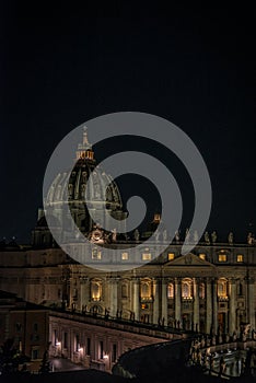 St Peter`s dome anf facade at night, Vatican city