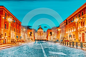 St. Peter`s Square and St. Peter`s Basilica, Vatican City in the evening time from street Conciliazione Via della Conciliazione