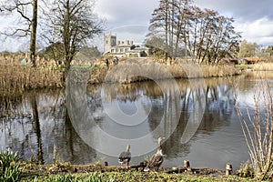 St Peters Church Coughton viewed across pond