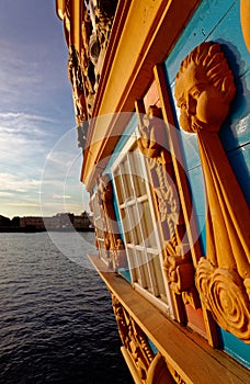 St. Petersburg on the background of an old wooden sailboat. Ship deck details