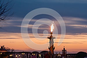 St. Petersburg city and Neva river embankment, Rostral columns with fire, May 9, 2023, St. Petersburg, Russia