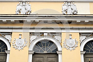 St. Petersburg, Russia, December 2019. Fragment of the facade of an old building with stucco moldings in the Roman style.