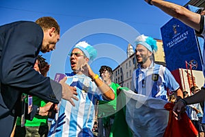 St. Petersburg, Russia - June 26, 2018: Journalist interviewing sport fans of Argentina football team.