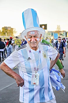 St. Petersburg, Russia - June 26, 2018: Smiling old fan of Argentina national football team