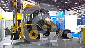 Wheel Excavator Loader JCB at an industrial exhibition. Production and supply of road construction, log handling and earthmoving e