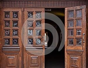 St. Petersburg, Russia - May 1, 2020,.Old wooden doors, entrance to the historic building, drawings on glasses