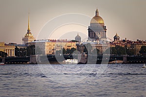 St. Petersburg, Russia - September 1, 2019 - View of St. Isaac`s Cathedral on a summer evening Admiralty building from the Neva.