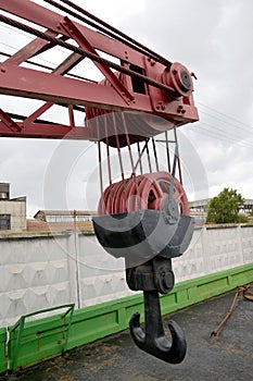 ST. PETERSBURG, RUSSIA. Shod two-horned hook, hook suspension bracket, block fragment of the railway Yanvarets DZh45 No. 71 crane