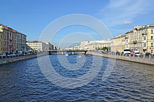ST. PETERSBURG, RUSSIA. A view of Fontanka River and Semenovsky Bridge in summer sunny day