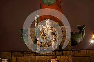 St. Petersburg. South rostral column. The male figure allegorically represents the Dnieper River. Night Photography.