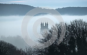 St. Pieters Church of Loker, Belgium on a misty winter morning