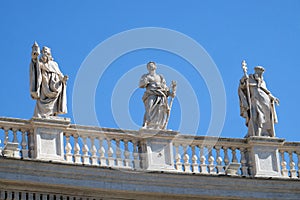 St. Romuald, Joseph and Peter Nolasco, fragment of colonnade of St. Peters Basilica. Papal Basilica of St. Peter in Vatican, Rome