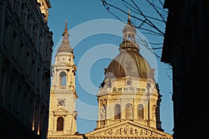 St. Stephen's Basilica in Budapest (Hungary) during sunset with clear blue sky - historical church