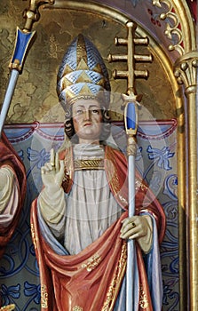 St Sylvester statue on the main altar in the St Nicholas church in Petschied near Luson, Italy