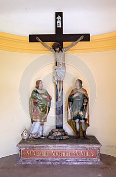 St Valentine martyr and St. Vitus martyr under the crucifix