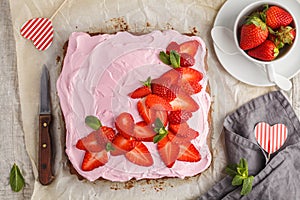 St.Valentine`s Day Cake for breakfast with pink glaze and fresh