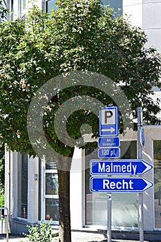 St. Vith, Belgium - 08 10 2023: Signs to Malmedy, Recht and the Parking Lot Sign, Am Viehmarkt