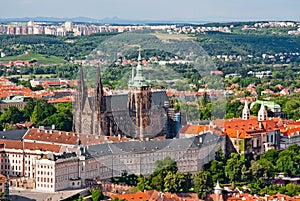 St. Vitus Cathedral over old town red roofs. Prague, Czech Republic