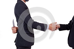 Stab back,two business men making a deal but hiding knives