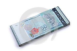 Stack of 50 Ringgit Malaysia on white
