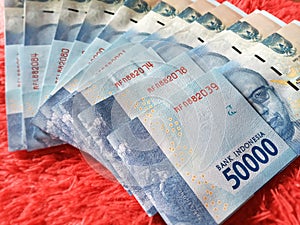 Stack of 50000 Denomination Indonesian Rupiah or Paper Money, Fifty Thousand Rupiah for Finance or Business Use