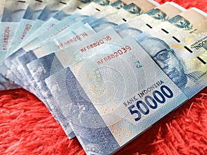 Stack of 50000 Denomination Indonesian Rupiah or Paper Money, Fifty Thousand Rupiah for Finance or Business Use