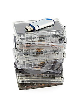 Stack of audio cassettes and flash memory