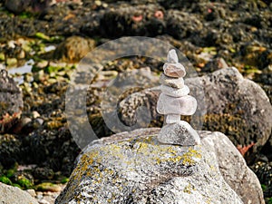 Stack of balance stones in nature environment.