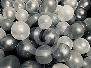 Stack of balloons unique object black and white photo