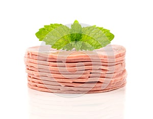 Stack of baloney sausage - food on white background photo
