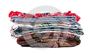 Stack of beautiful handmade quilts.