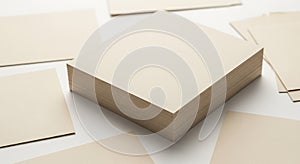Stack of beige cardboard sheets on a white background