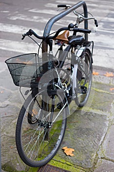 Stack of bicycles parked near the bike lane