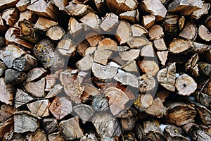 A stack of birch firewood - a natural background