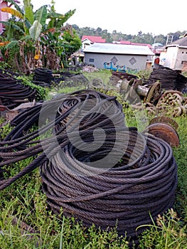 Stack of black industrial cables.