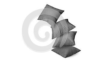 Stack of black pillows isolated on white background