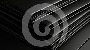 A stack of black rectangular objects with a glossy finish.