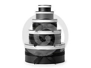 Stack of black and white gift boxes isolated on white background