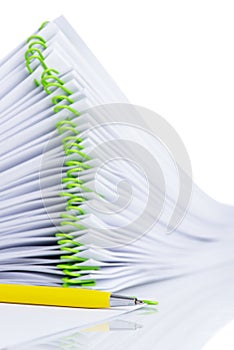 Stack of blank document with paper clip on white