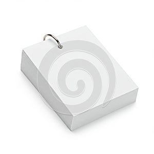 Stack of blank index cards held together with a metal binder ring isolated on white background