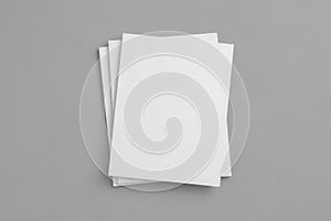 Stack of blank magazines mockup on gray background