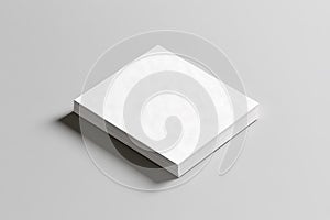 Stack of blank square papers on gray background