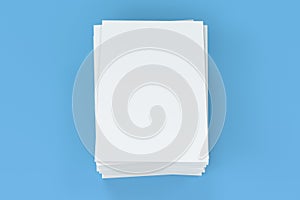 Stack of blank white closed brochure mock-up on blue background