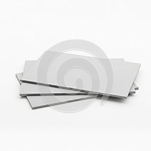 A stack of blank white paper sheets on a white background