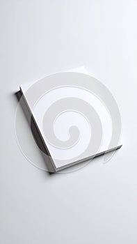 Stack of blank white paper sheets on a light surface with shadow