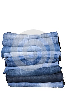 Stack of blue denim jeans