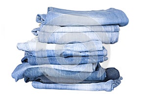 Stack of blue denim jeans