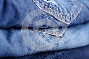 Stack blue jeans closeup