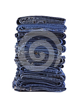 Stack of blue jeans isolated on white background