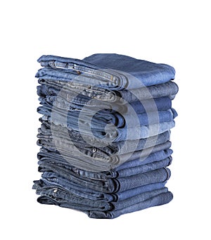 Stack of blue jeans isolated on white background